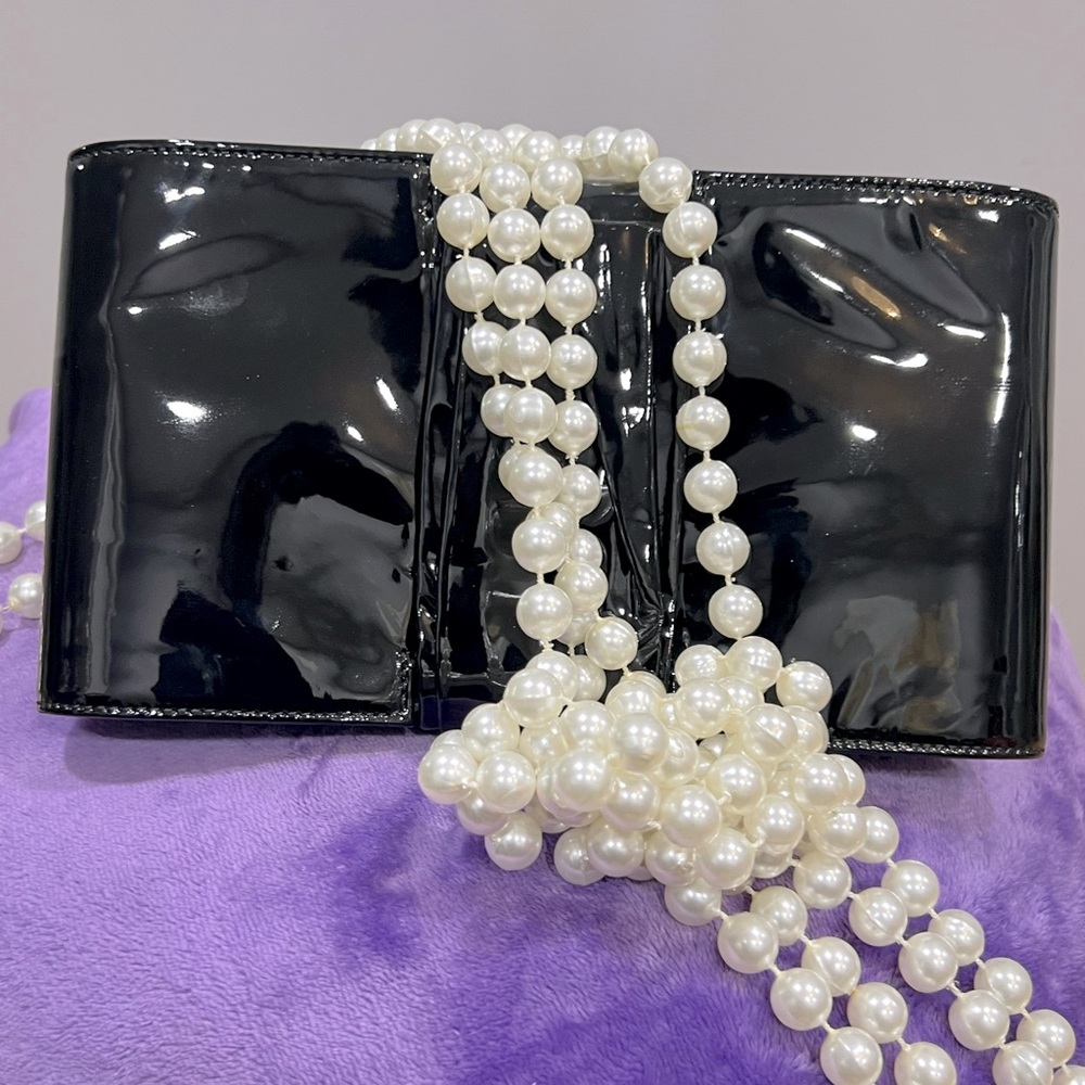 Christian Louboutin Clutch- Stylish Patent Leather Clutch